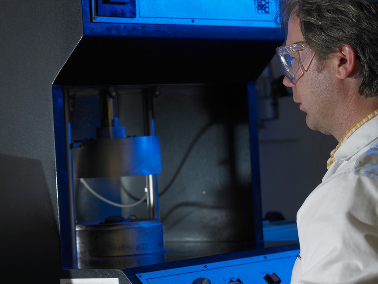 man observing curing process